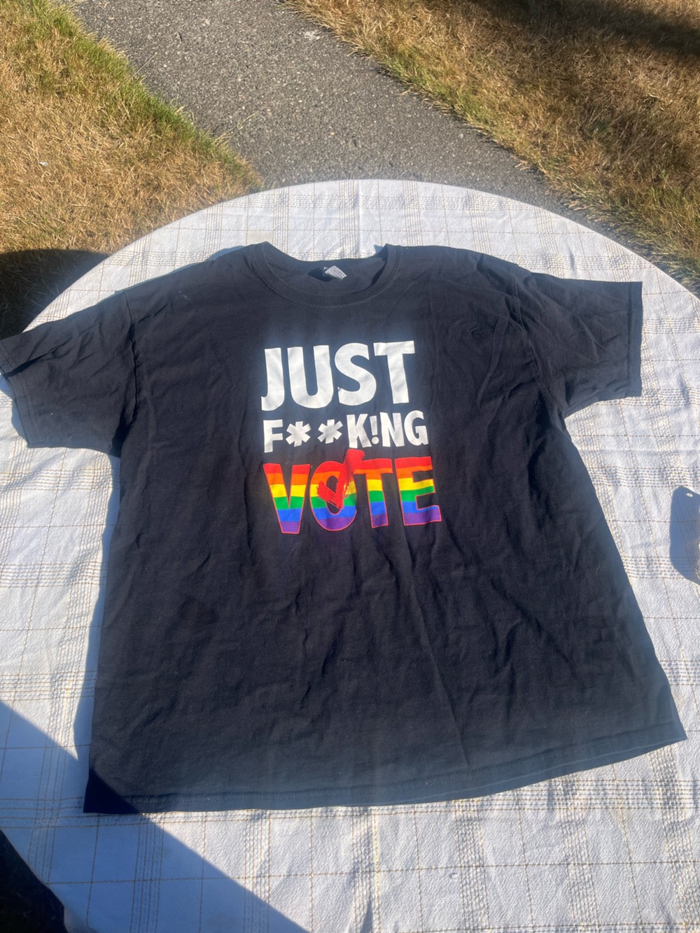 Black Short‑Sleeve Graphic Tee with Rainbow 'VIBE' Print